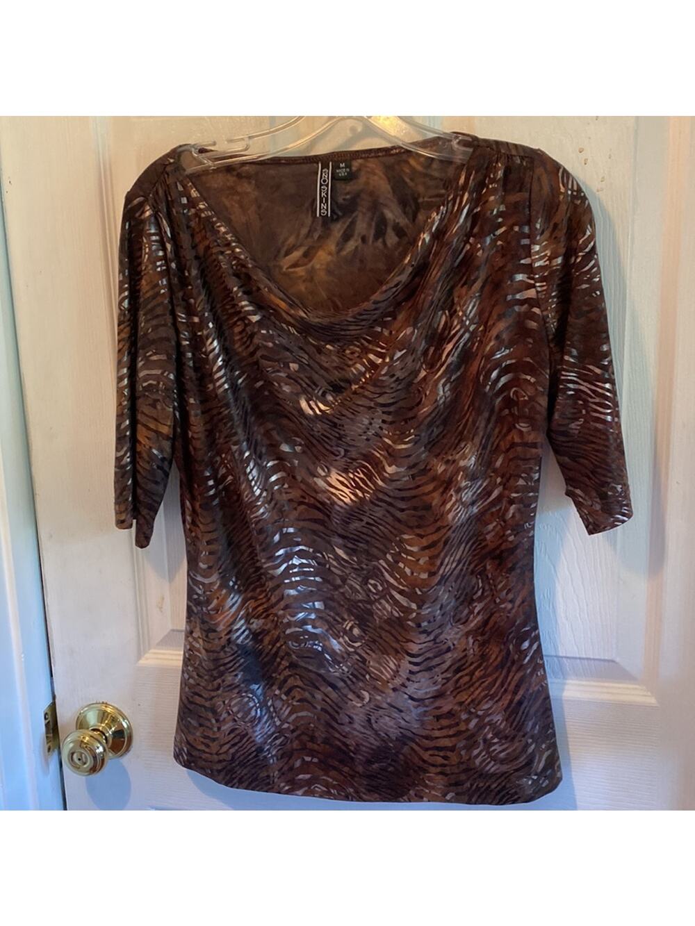 Sno Skins women’s size medium animal print top